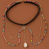 chaine de cuisse coquillages et perles