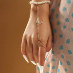bracelet bague perle avec pendentif papillon